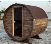IVA SAUNA Barrel MINI 1.8 – компактна външна дървена сауна за двор
